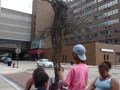 Children with dancer sculpture